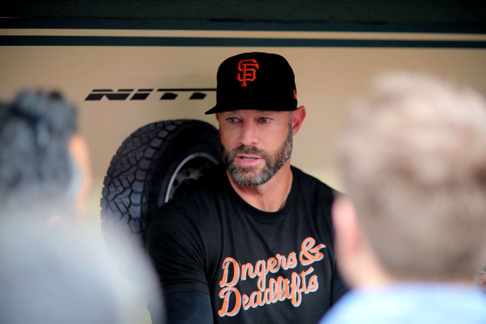SF Giants manager Gabe Kapler answers questions from the media in the dugout prior to a game against the Houston Astros. (2023)